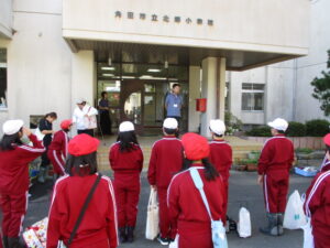 稲刈り体験の様子（令和７年度北郷小学校体験学習）